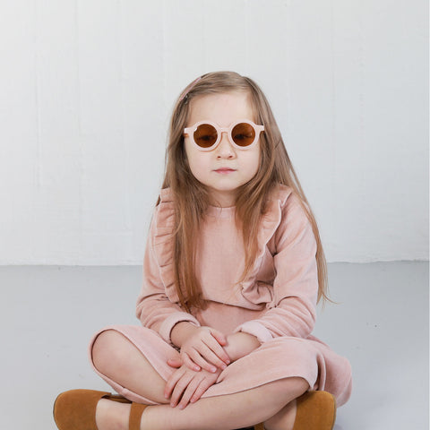 Cool pink kids dress in organic cotton with frills at front