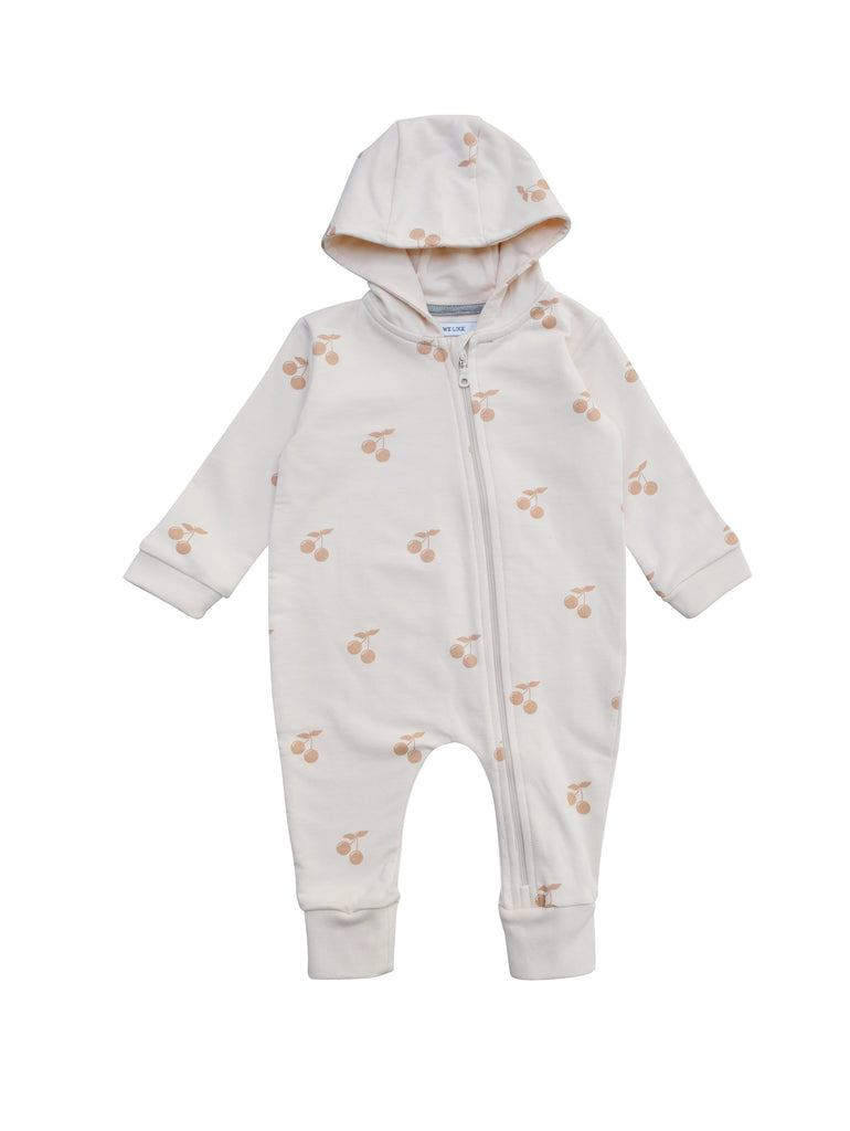All in one baby suit with zipper in front and lined hood. Wear it on it's on as a relaxed sweatshirt suti or with a body underneath as layer two. Cherry print all over on soft pink. Made of 100% organic cotton in Portugal. 