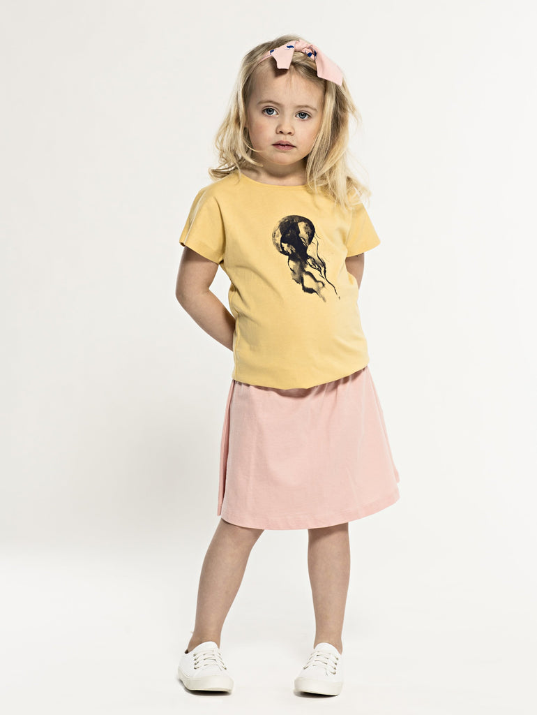 SS19 spring collection from One We Like made of 100% organic cotton. A-line skirt with elastic waist and bow with milkshakes on front.